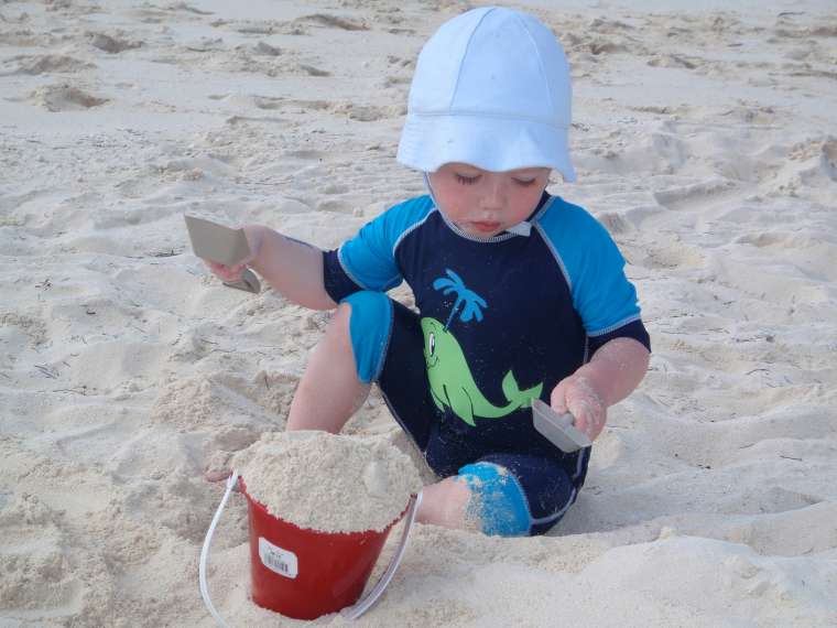 Zeke enjoying the sand